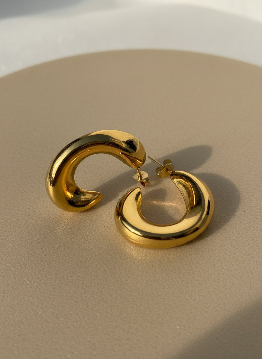 Sculpted gold hoop earrings