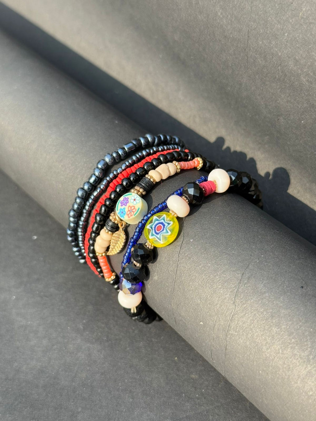 Black floral bracelet stack