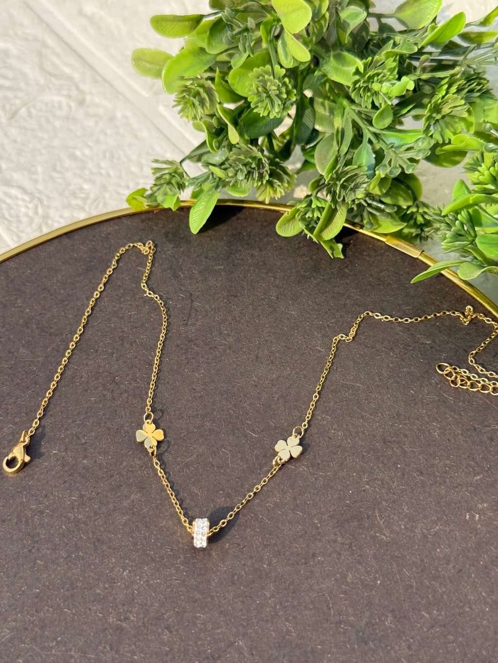 Golden clover charm necklace