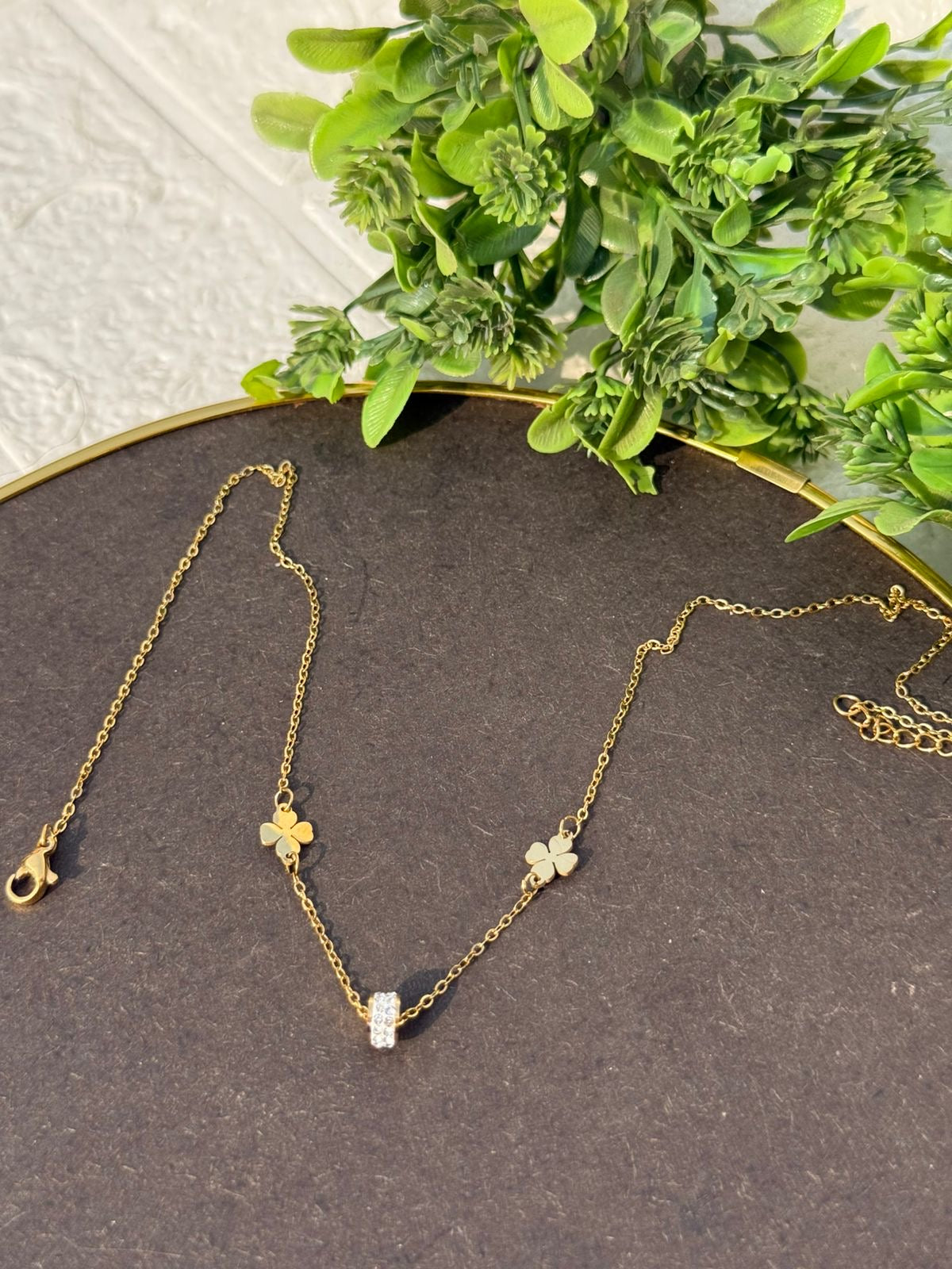 Golden clover charm necklace