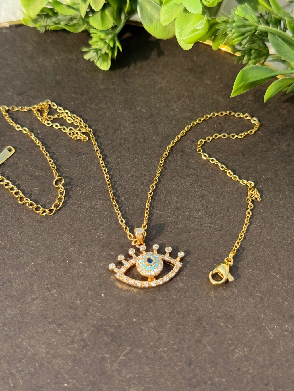 Radiant evil eye pendant necklace- with rotating eyeball