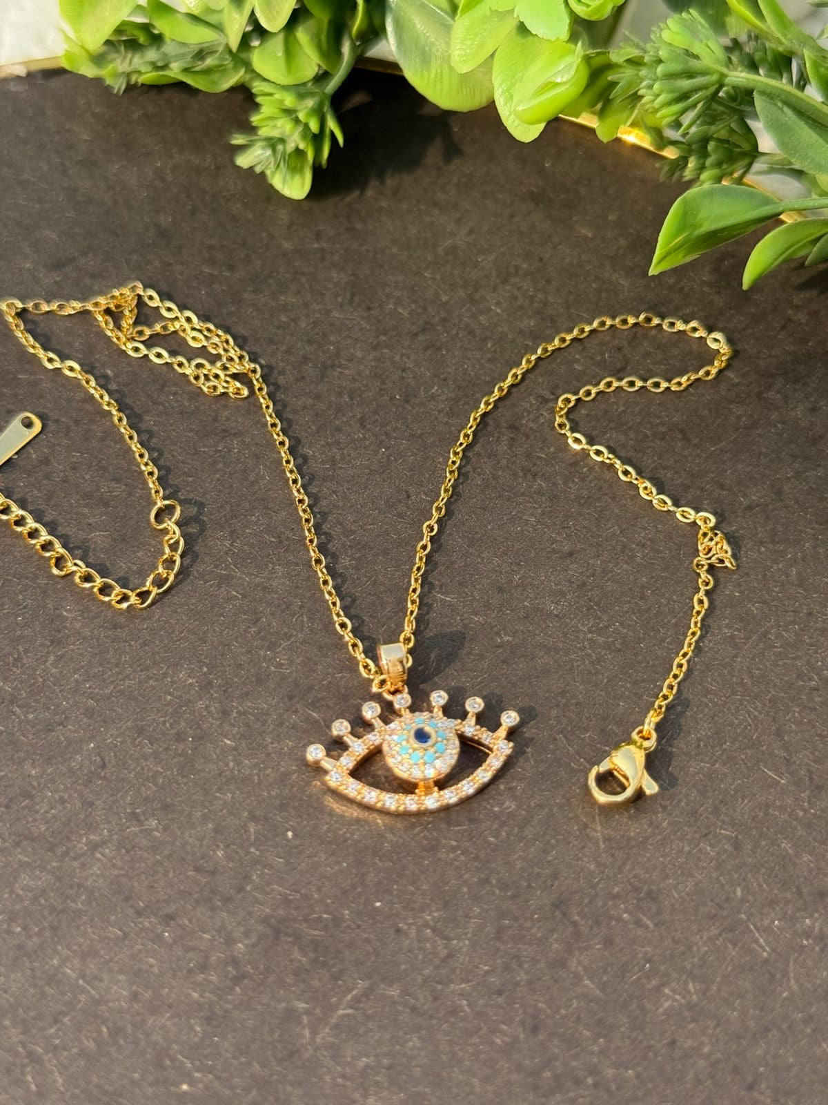 Radiant evil eye pendant necklace- with rotating eyeball