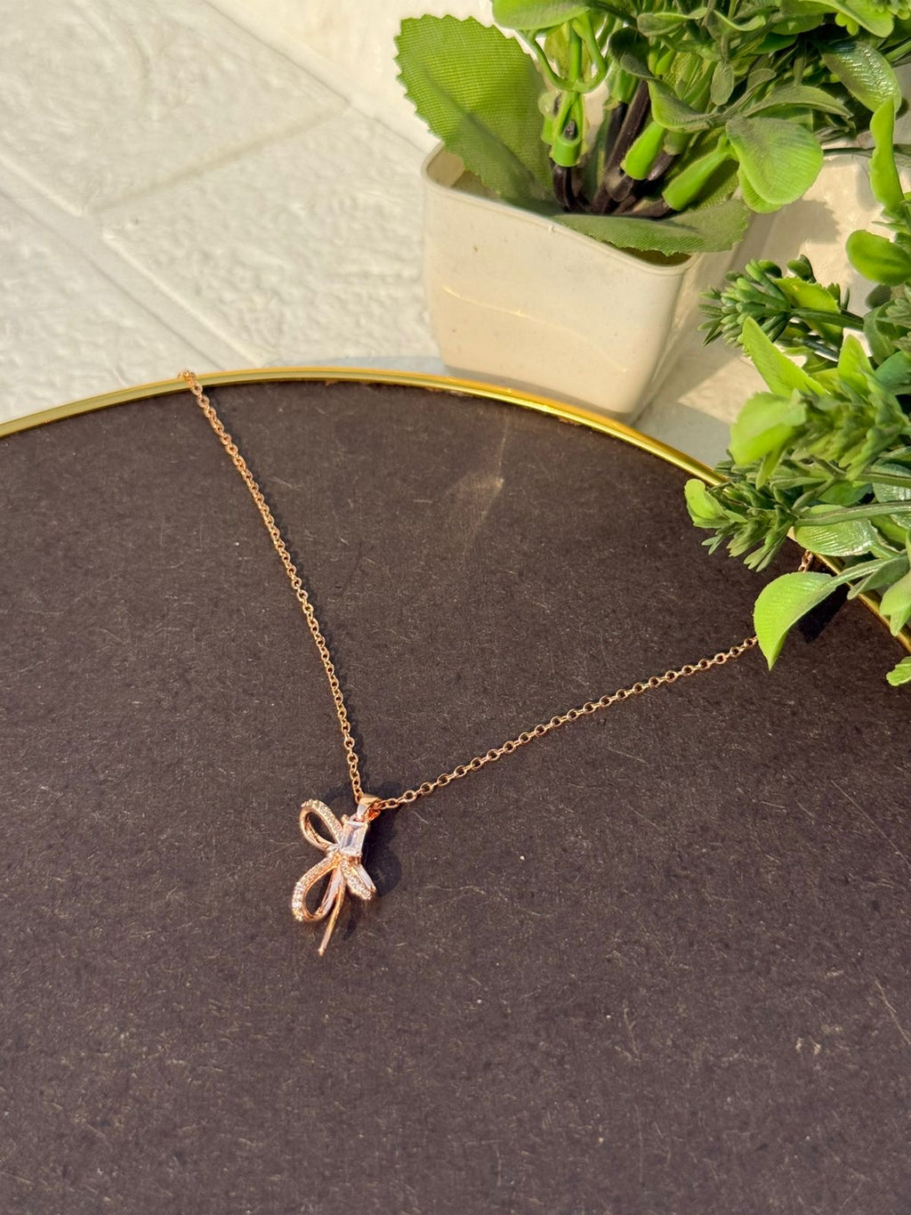 Rose gold bow pendant necklace