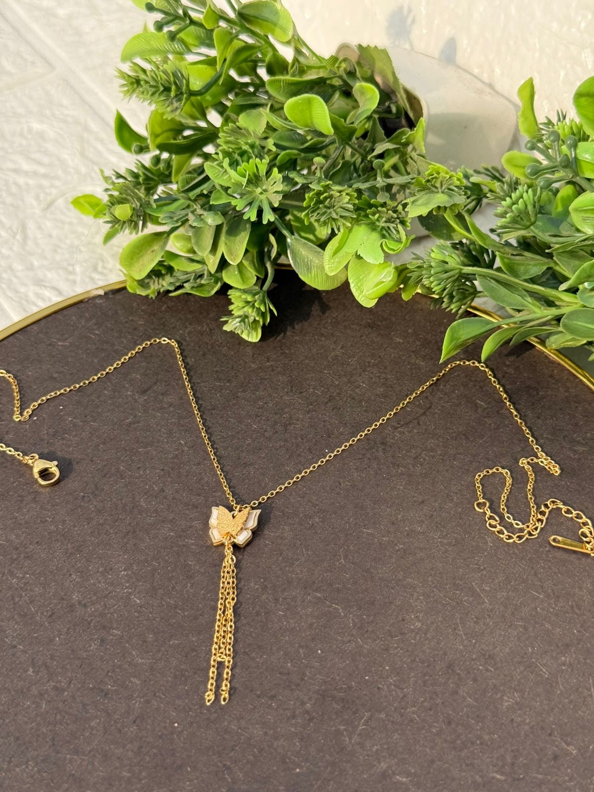 Golden butterfly tassel pendant necklace