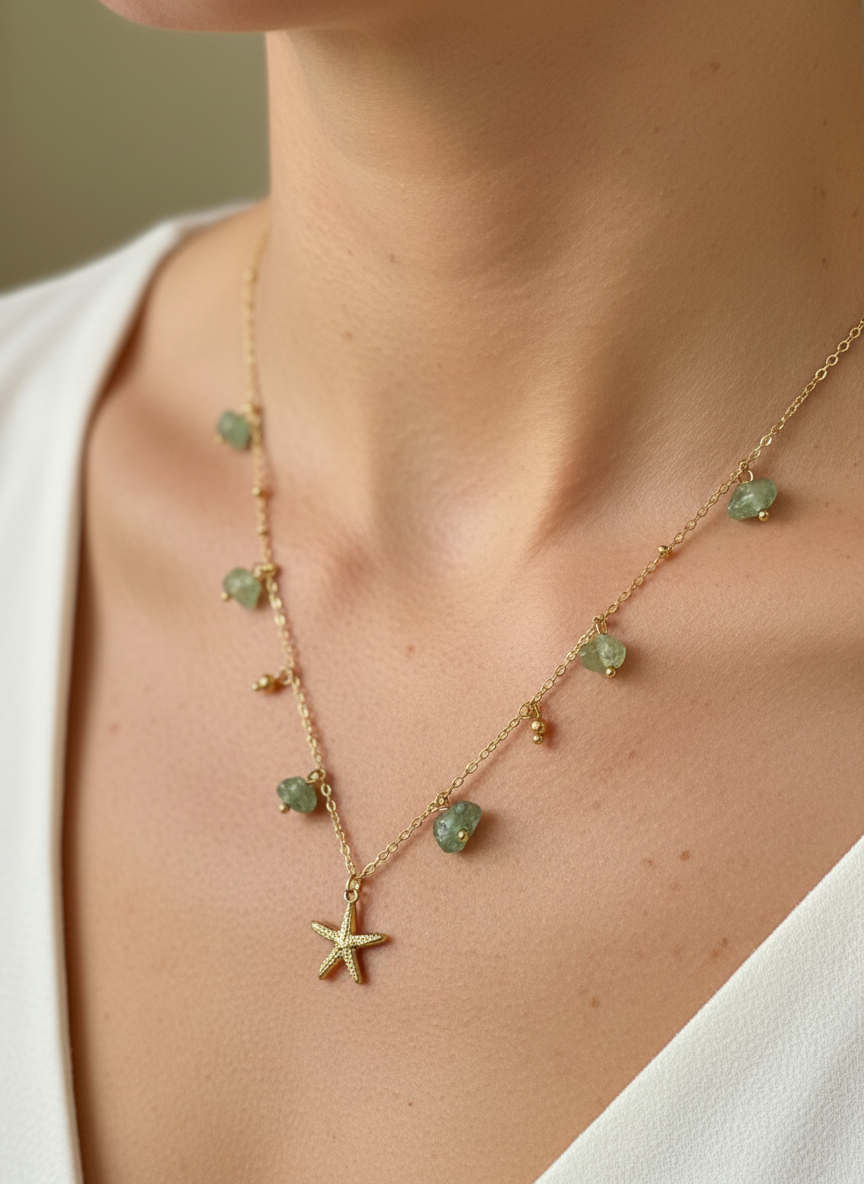 Starfish charm necklace with green gems