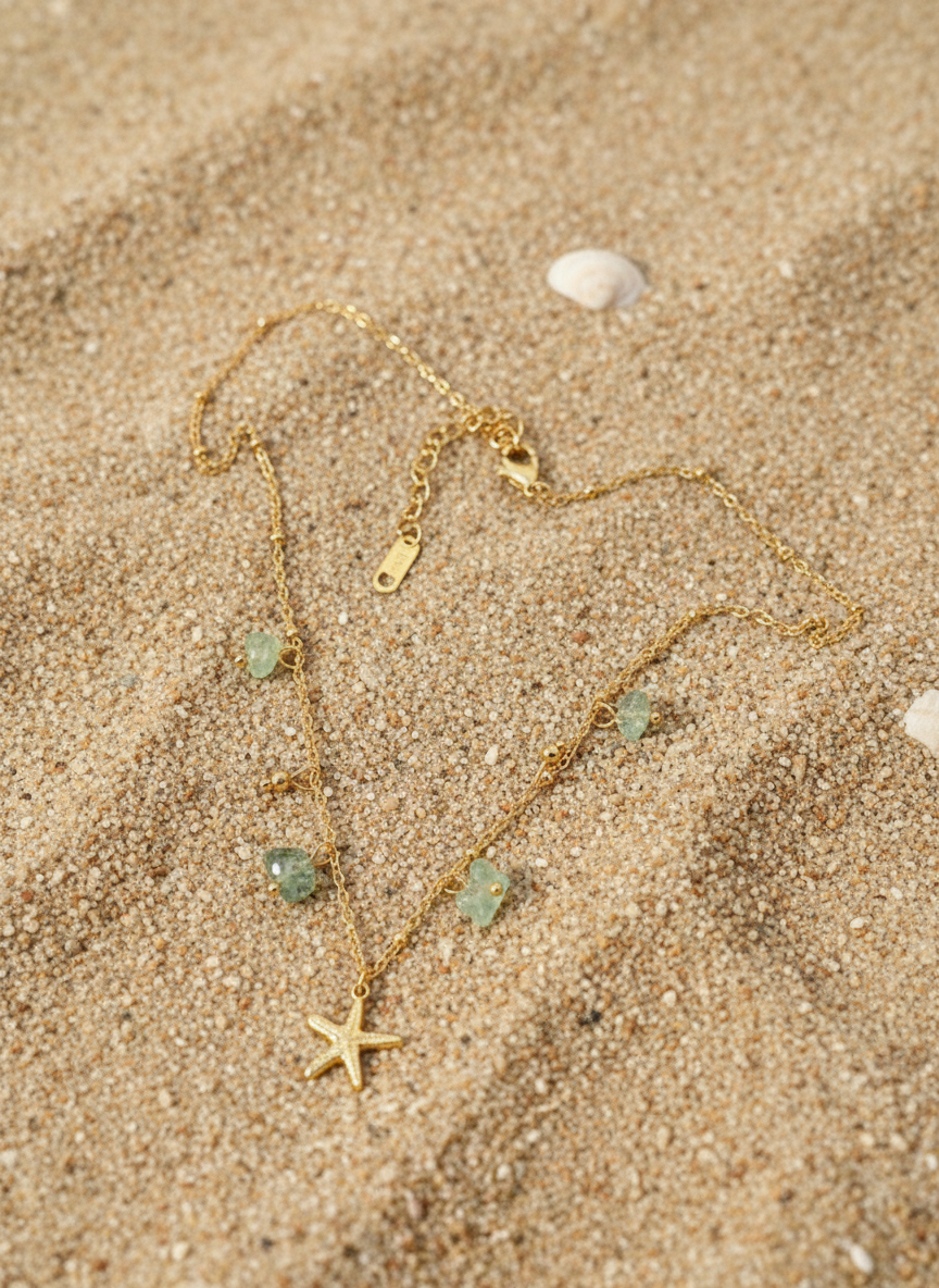 Starfish charm necklace with green gems