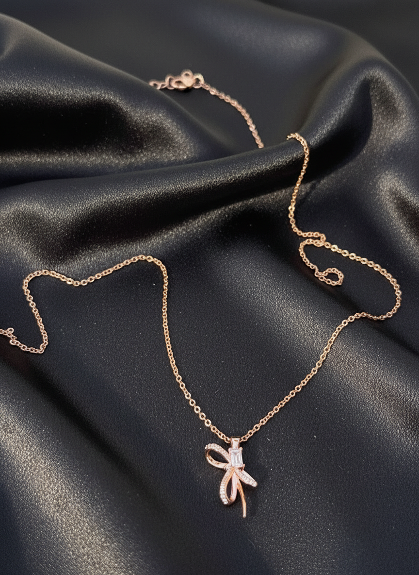 Rose gold bow pendant necklace