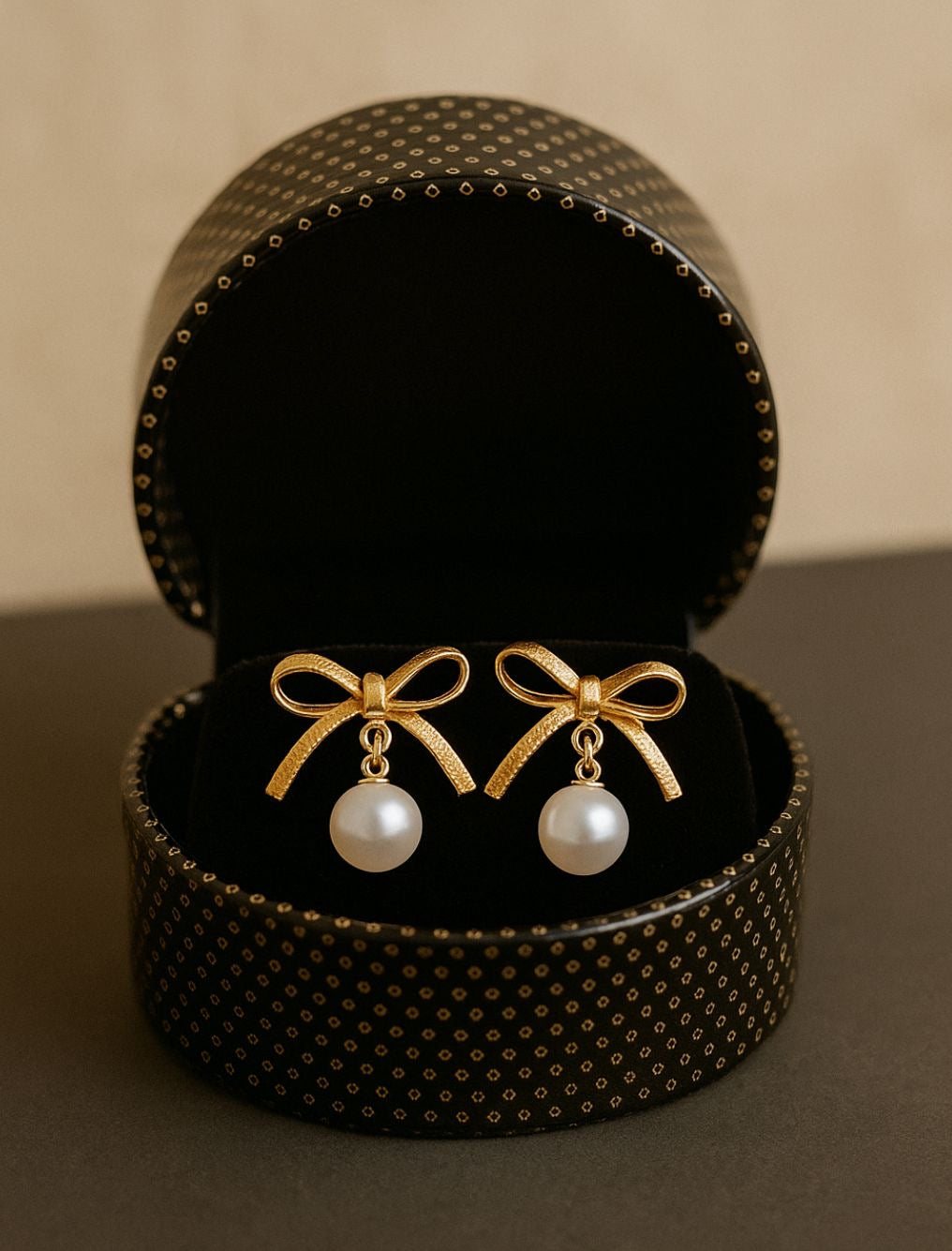 Golden bow pearl Earings